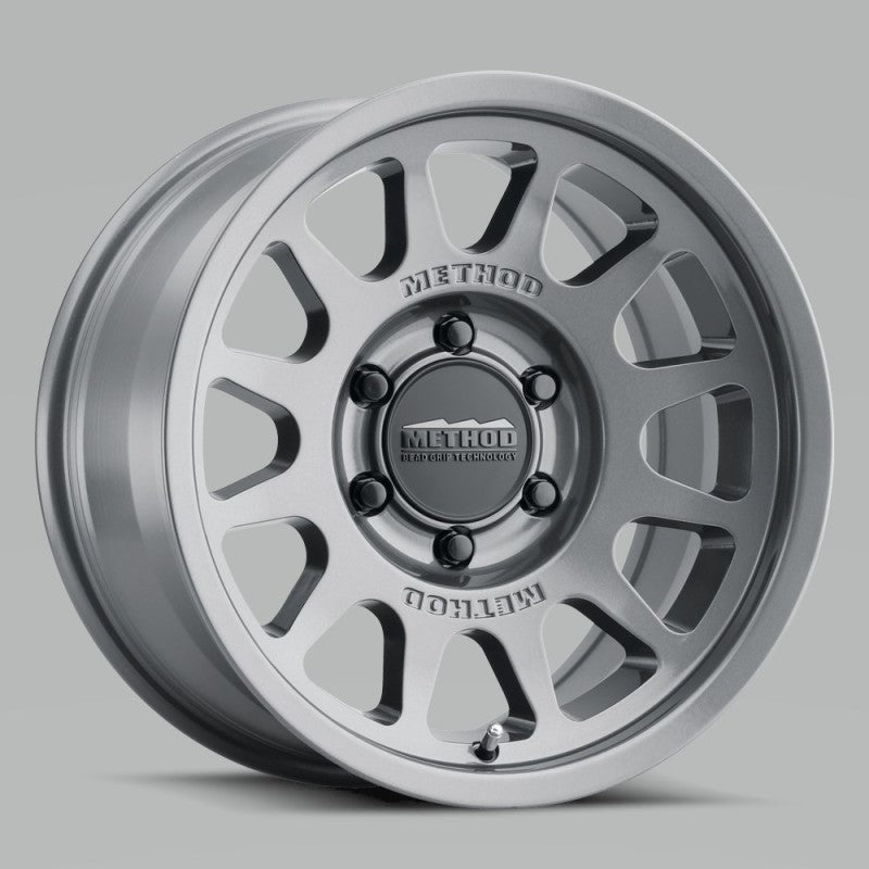 Method MR703 17x8.5 0mm Offset 6x5.5 106.25mm CB Gloss Titanium Wheel